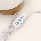 Luna | Lampada dal design organico con rilievo sferico lunare · 17 cm